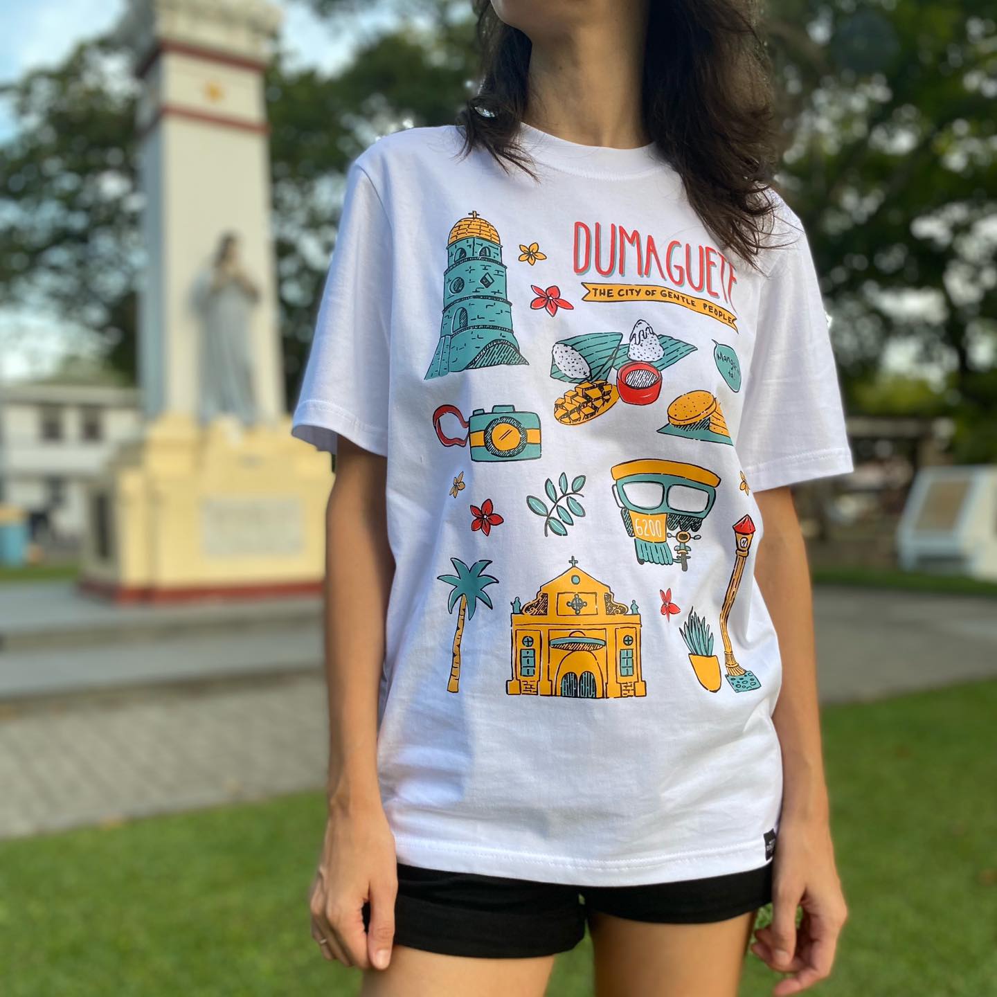 Dumaguete city of gentle people Negros Oriental capital Philippines Filipino artist local art scene gift idea souvenir budbod mango tsokolate tricycle Belfry Campanario Rizal Boulevard wear cloth shirt white size pinoy