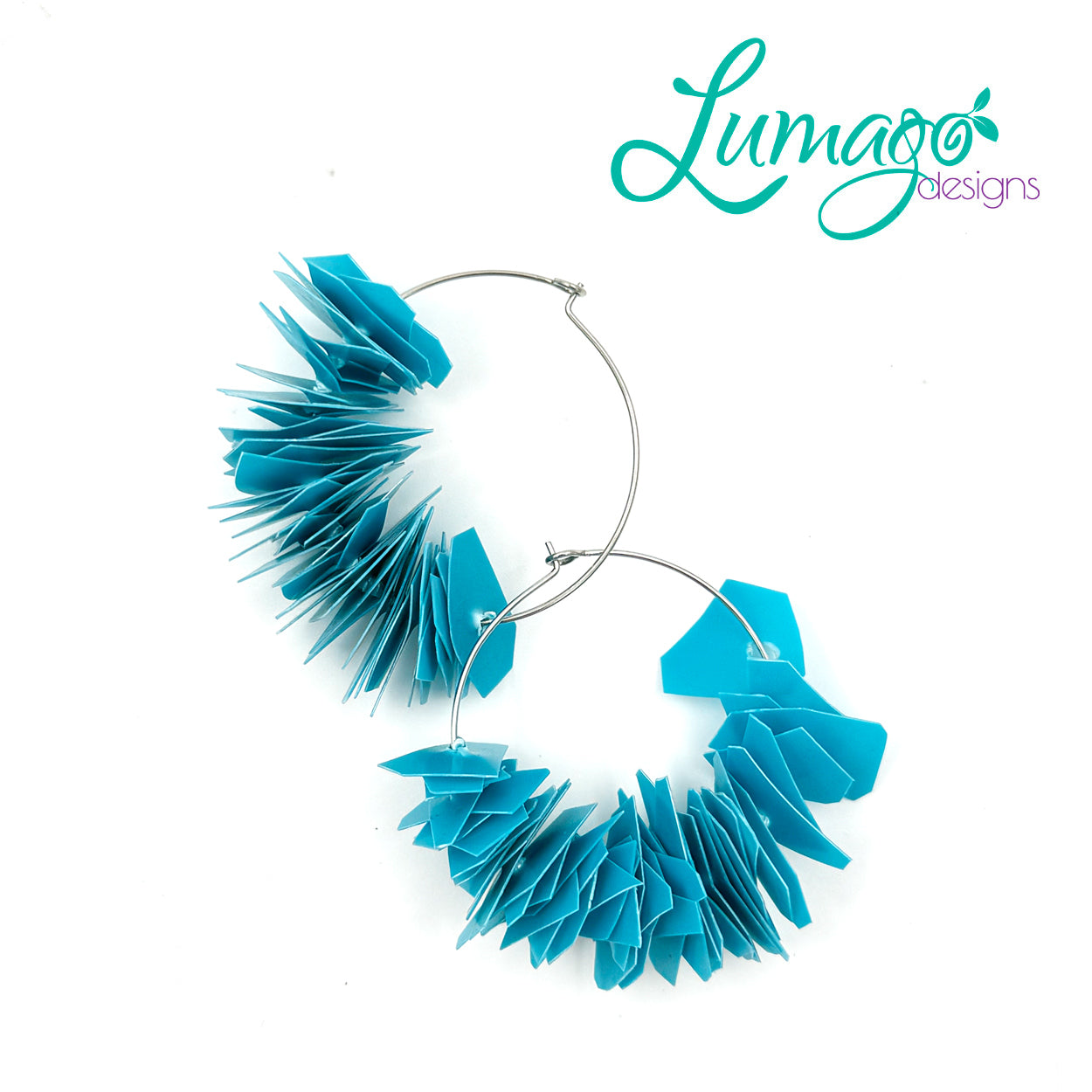 Lumago Designs, Ethical Jewellery, Sustainable, Home decoration, recycled, recycling paper, paper beads, craftsmanship, Filipino woman, art, artist, jewellery, earrings, bracelet, bead, zero waste, plastic waste