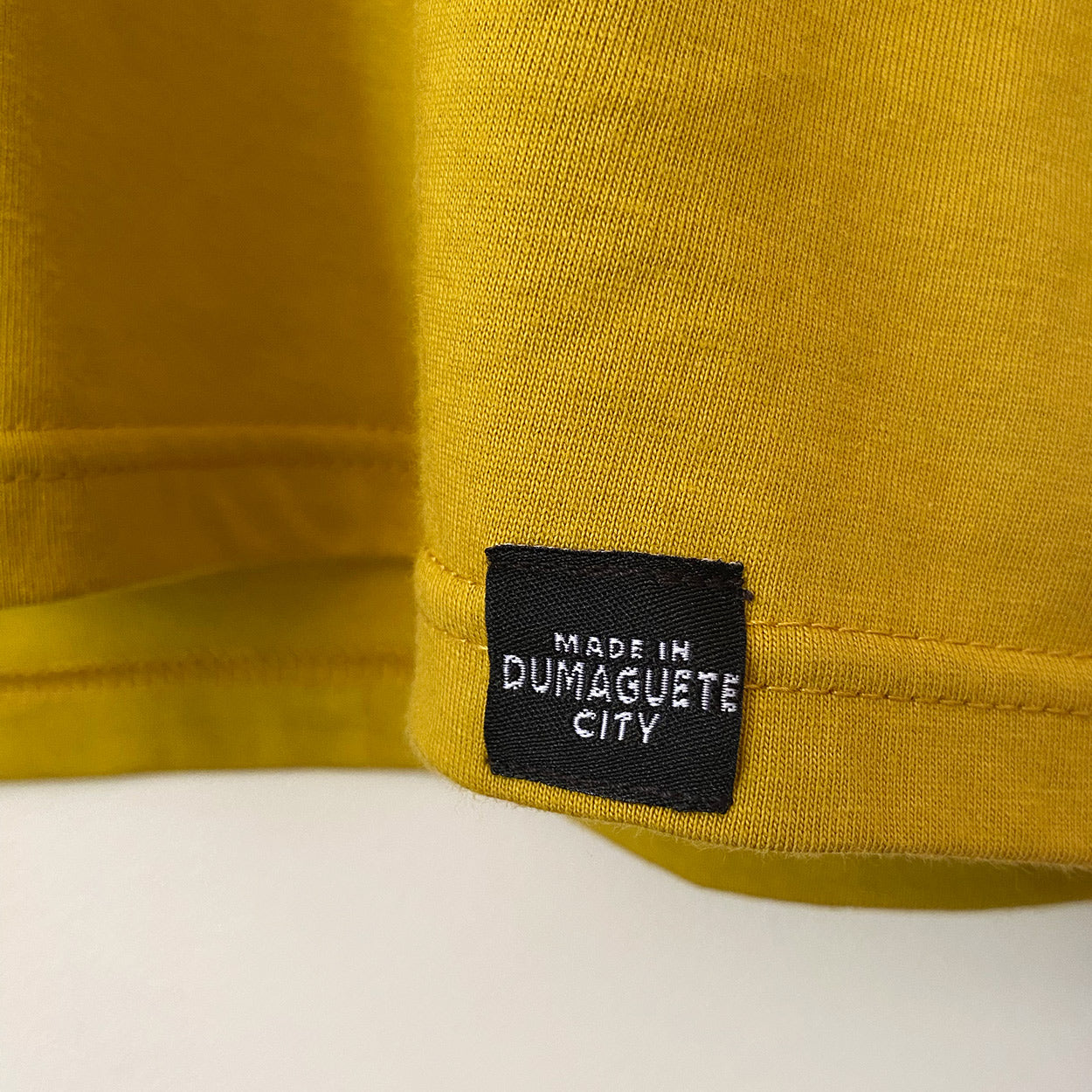 Moshi Dokyo Dumaguete city graphic artist art scene vector duck food illustration outfit wear cotton shirt 6200 Negros Oriental Philippines tourist souvenir Made in City of Gentle People logo label
