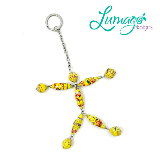 Lumago Designs, Ethical Jewellery, Sustainable, human, keychain, recycled, recycling paper, paper beads, craftsmanship, Filipino woman, art, artist