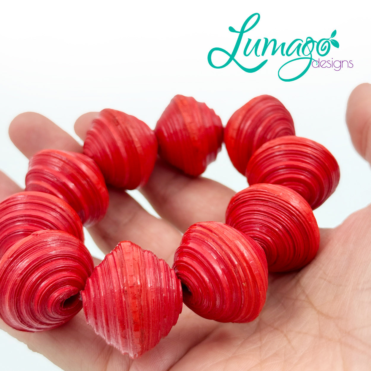 Lumago Designs, Ethical Jewellery, Sustainable, recycled, recycling paper, paper beads, craftsmanship, Filipino woman, art, artist, jewellery, bracelet, bead, tribal