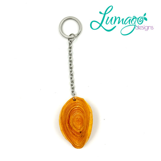 Lumago Designs, Ethical Jewellery, Sustainable, souvenir, recycled, recycling paper, paper beads, craftsmanship, Filipino woman, art, artist, keychain, bead