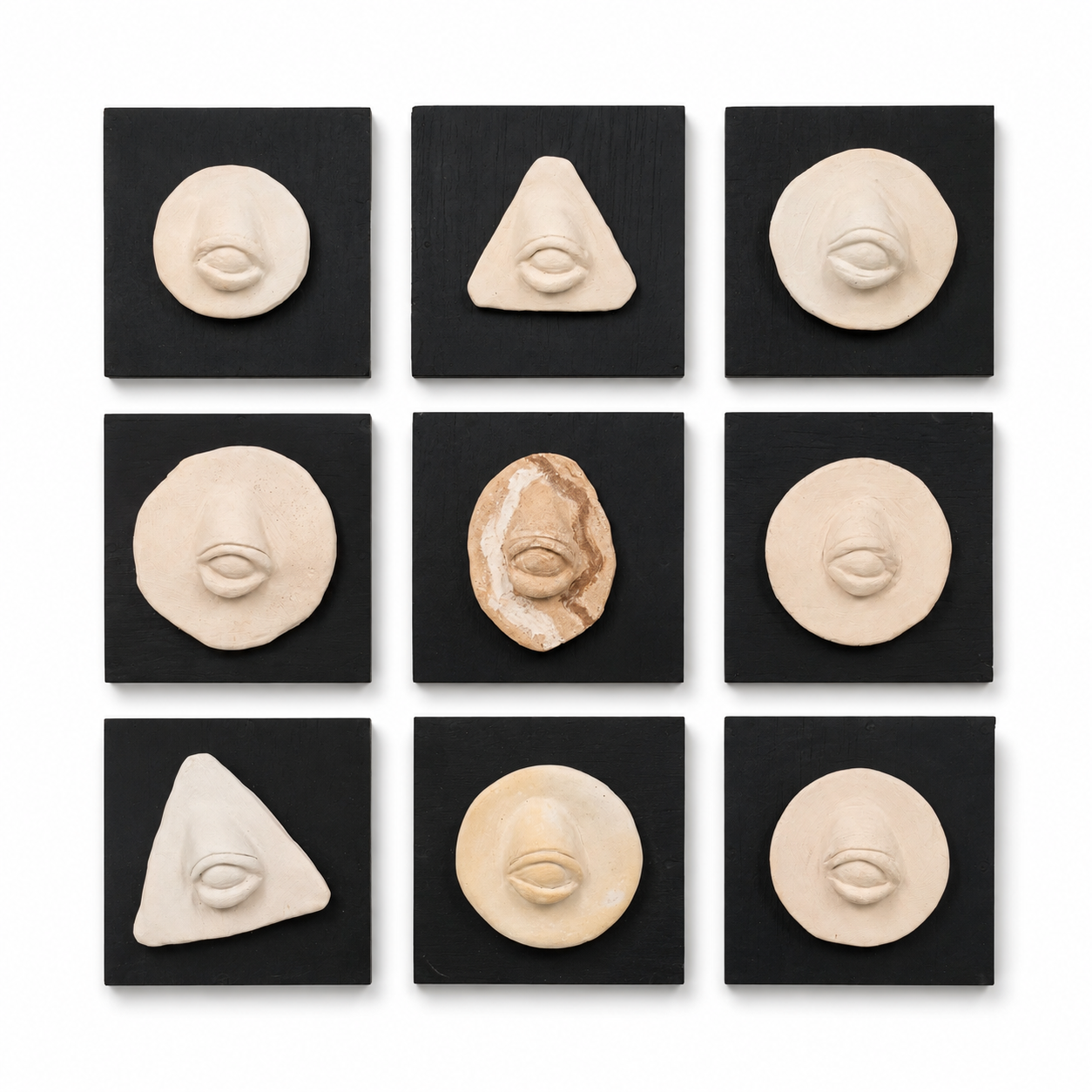 Original artwork, Dumaguete City, Negros Oriental, Philippines, Filipino artist Mikoo Cataylo de Leon, handcrafted sculpture, eye relief, ceramic art, clay artwork, sculptural art, organic shapes, textured surface, minimalist art, monochromatic artwork, handmade art, authentic artwork, wall decor, creative art, Pinspired Art Gallery, MICRA Art Show, eye sculpture, abstract eye, geometric forms, natural clay tones, contemporary art, gallery artwork